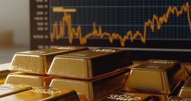 Gold bars and a financial chart