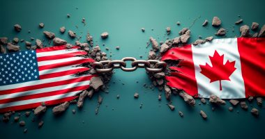 US and Canadian flags with a chain between them