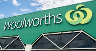 Woolworths supermarket logo over a store