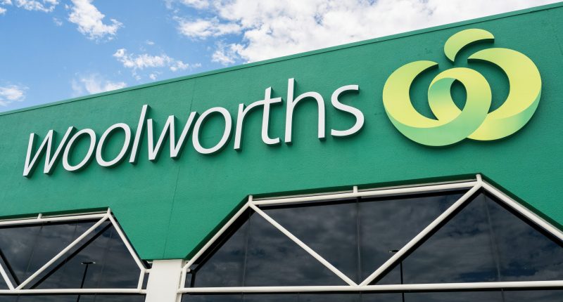Woolworths supermarket logo over a store