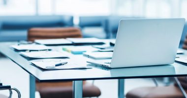 Laptop on board room table