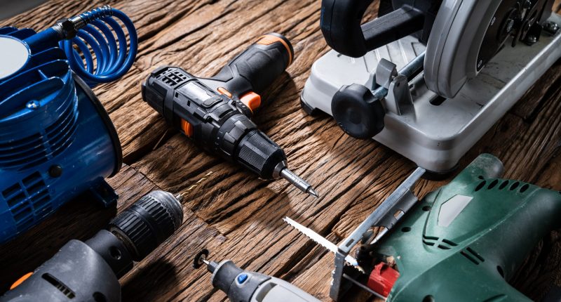 Power tools on a wooden surface