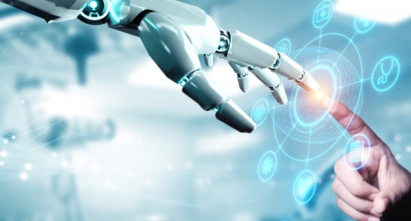 Robot hand reaching out to a person